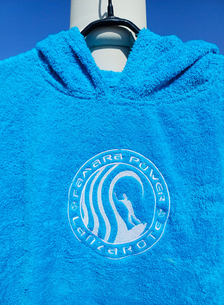 Famara Power Poncho Niño o Niña 25